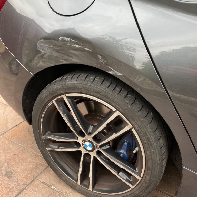 Dented rear quarter panel Dent repair